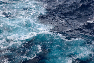 Fototapeta na wymiar sea waves behind the ship