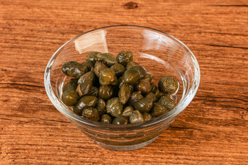 Tasty capers in the bowl