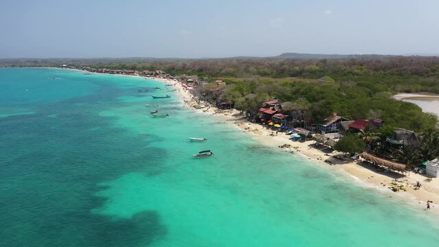 The paradies beach of Playa Blanca on Island Baru by Cartagena in Colombia aerial view.