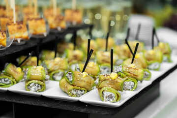 Festive buffet table with many snacks and appetizers