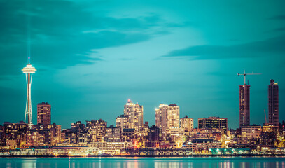 scenic view of Seattle city in the night time with reflection of the water,Seattle,Washington,USA.