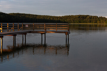 Wooden footbridge in the lake
