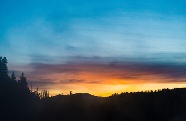 Fototapeta premium mountain with sunset cloudy sky.