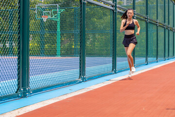Young women run for fitness in the morning
