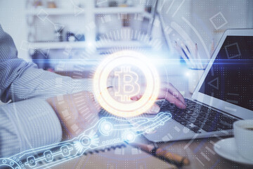 Blockchain theme hud with man working on computer on background. Concept of crypto chain. Double exposure.