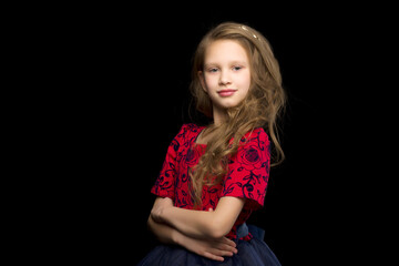 Close Up View of Cute Smiling Blonde Girl Posing on Black Background.