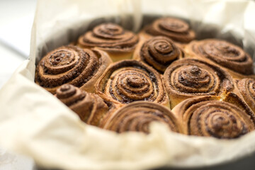 Fresh rolls Cinnabon, Cinnamon rolls in the form. Flavorful pastries