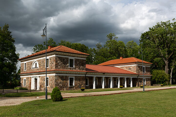 Rokiskis manor and park in sunny summer day