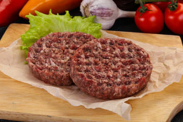 Raw burger cutlet
