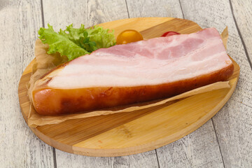 Smoked pork breast with salad leaves