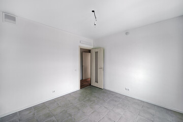 Empty room after repairs in an apartment building