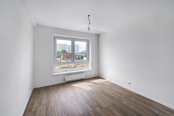 Empty room after repairs in an apartment building