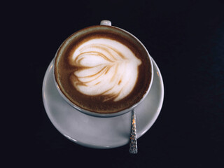 Cup of hot latte or cappuccino art coffee