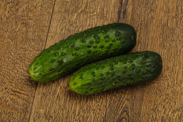 Ripe fresh green two cucumbers