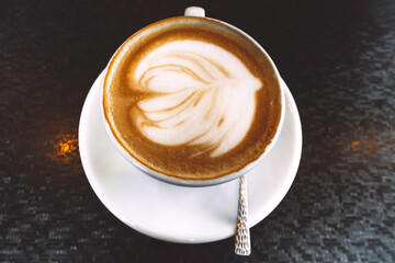 Cup of hot latte or cappuccino art coffee