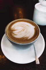 Cup of hot latte or cappuccino art coffee