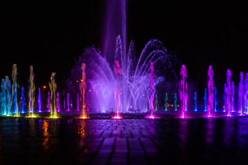 Warsaw city center is illuminated at night by artificial lighting