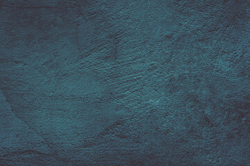 Old wall pattern texture cement turquoise with a purple tint.Beautiful Abstract Grunge Decorative Navy  Stucco Wall Background.Art Rough Stylized Texture Banner With Space For Text,cement background. 