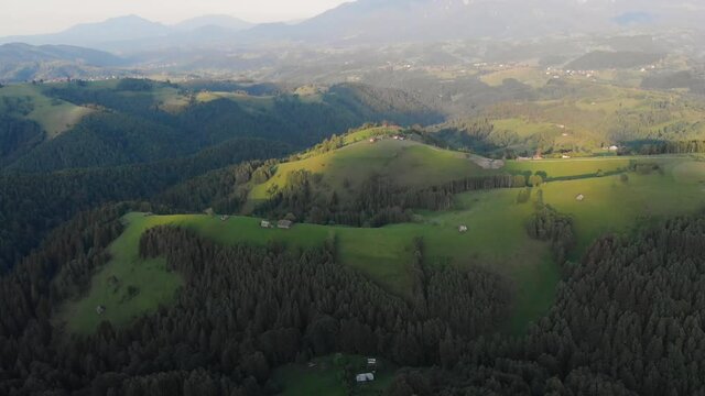 Sunrise over the green hills of Transylvania