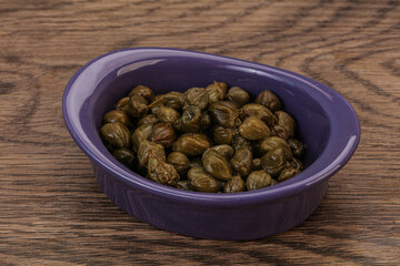 Tasty capers in the bowl