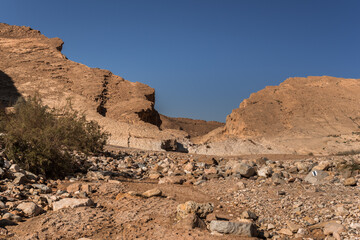 Crescents Spring round trail in Ramon Crater, at its eastern end, near the small town of Mitzpe Ramon, Ramon Nature reserve, Negev desert, Israel.
