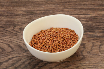 Raw buсkwheat cereal in the bowl