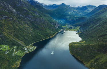 Aerial view Geiranger fjord in Norway landscape cruise ship sailing travel scenery mountains nature summer season