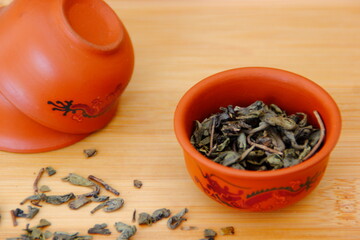 Green tea  cup on the  bamboo background.