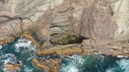 mighty ocean spitting out the cliffs