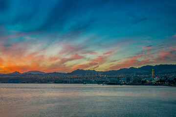 Sunset over the Red Sea in Eilat - famous tourist resort and recreational city in Israel