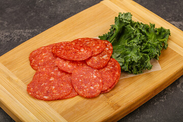 Italian spycy pepperoni sausage slices