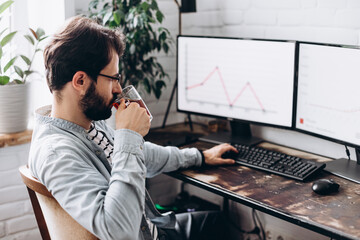 Attractive young man working at a computer