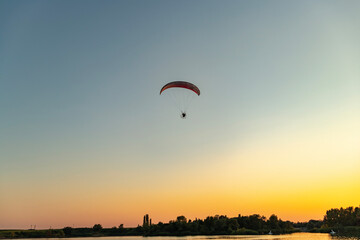paraglider at sunset
