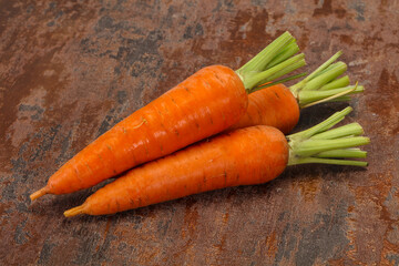 Three Young fresh ripe carrot