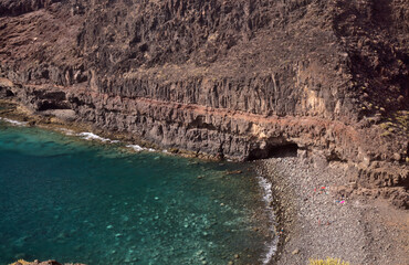 Gran Canaria, steep eroded coast line of Agaete municipality, path to Playa del Juncal beach 