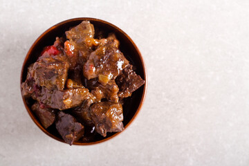 Spicy beef liver pieces with gravy