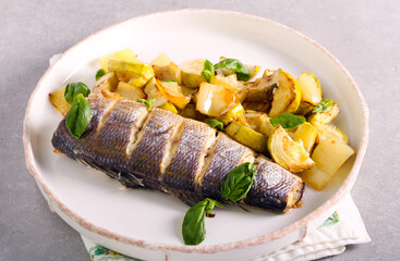 Baked sea bass fish with vegetables