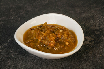Green spicy sauce in the bowl