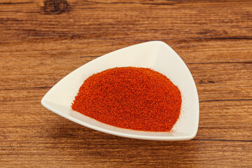 Dry paprika powder in the bowl