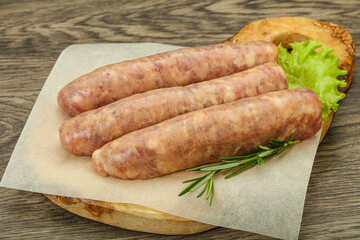 Raw pork meat sausages for grill