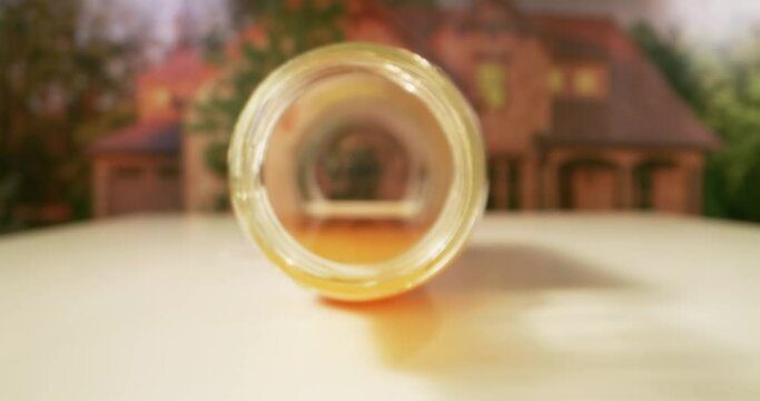 Bottle lied on side with orange juice inside