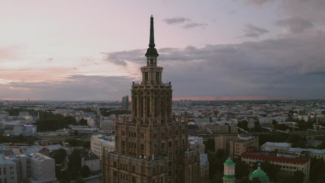Aerial view over Riga city at dusk. Impressive skyscraper and architecture with scenic view over city.