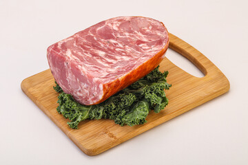 Beef ham piece over board