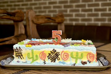 Childrens cake for a boy of five years happy birthday