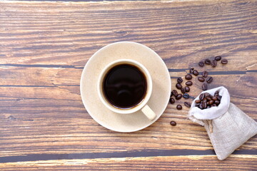 cup of coffee on wooden table