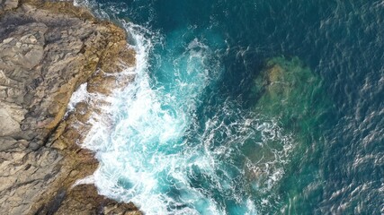 mighty ocean spitting out the cliffs