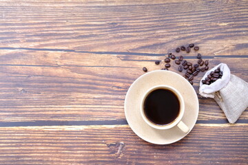 cup of coffee on wooden table