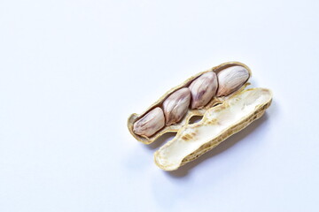 boiled peanuts peel out on white background