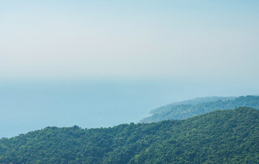 View of the mountainous tropical coast covered with rainforest