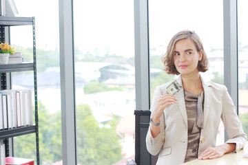 Successful businesswoman receive money to bribe after meeting for job in office. Corruption Concept.